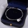 Pulseira de Pérolas Redondas de Linha Dupla Fina Estilo Francês Levemente Luxuoso Moda Estilo Ins Pulseira de Osso de Cobra de Camada Dupla com Contas Redondas