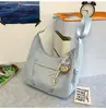 Bolso Casual Simple tipo Bollo 2025 Nueva Moda Bolso de Hombro Textil Gran Capacidad Viaje Commuter Bolso Cruzado Versátil