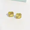 Pendientes de Trébol de Cuatro Hojas Mini de 9 mm de Venta Caliente Transfronteriza, Joyería Sencilla para Mujer, Pendientes de Acero de Titanio Color Oro 18K Conservante de Color por Vacío