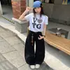 Pantalones de guadaña de nuevo estilo con un ambiente americano de alta gama, geniales, marca moderna unisex, jeans de guadaña casual de corte holgado