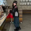 Chaqueta para niña 2026 otoño nuevo estilo coreano genial chaqueta de motociclista para niñas mayores con estampado color block y cuello alto top moderno