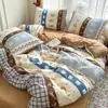 Al por mayor Nuevo Set de Cuatro Piezas de Gasa de Doble Capa con Sensación de Nube Estilo Ins Set de Tres Piezas para Dormitorio de Estudiante Sábana Plana Sábana Ajustable Funda de Edredón