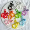 Pingente Acrílico Vazado Estrela de Cinco Pontas Estilo Ins Chaveiro Divertido de Verão Acessório Decoração para Capa de Fone de Ouvido Sem Fio