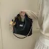 Bolso Cubo Retro de Gama Alta para Viajeros 2026 Nuevo Estilo Bolso de Mano Rombo Moda de Nicho Bolso de Hombro Cruzado