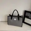 Bolsa Xadrez Casual de Grande Capacidade 2025 Nova Bolsa Tote para Estudante e Comutador Bolsa Transversal Casual com Textura Contrastante