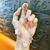 Cadena para Teléfono con Lentejuelas que Cambian de Color Sensible a la Luz Transfronteriza Llavero Colgante de Estrella de Cinco Puntas Accesorios para Bolsos Venta al por Mayor de Comercio Exterior