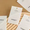 Etiqueta Colgante Nueva Marca Tienda de Ropa Etiqueta de Ropa Personalización Tarjeta Blanca Simple Personalización Moda Femenina Personalización
