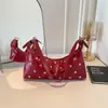 Nuevo Bolso de Axila con Remaches para Commuter Otoño 2026 para Mujer, Bolso de Mano y Bolso Cruzado de Estilo Coreano Simple de Alta Gama, Bolso para Mujer al por Mayor