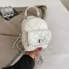 Mochila de mujer estilo Chanel 2026 nueva mochila de moda de moda bolso cubo de cadena de alto valor bolsa de viaje transfronteriza