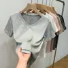 Nova camiseta de verão feminina estilo europeu e americano, justa, fina, canelada, de manga curta, top casual solto versátil