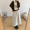 Falda acolchada gruesa de color liso retro japonesa casual coreana para mujer, nueva, versátil, ajustada, de vuelo, para otoño e invierno