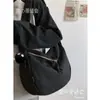 Bolsa de lona impermeable de nailon, bolsa de moda moderna, otoño e invierno, estilo Mori artístico, bolsa de albóndiga, estudiante universitario, clase, hombro, al por mayor