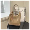 Venta al por mayor del fabricante Bolsas tejidas nuevas, Bolsas de playa de paja huecas, modernas y versátiles, Bolsos de hombro tipo tote de gran capacidad para el trabajo