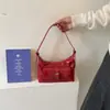 Bolsa de nicho moderna de alta qualidade para mulheres, nova moda 2026 bolsa transversal versátil, bolsa de ombro e sob o braço mais vendida no verão