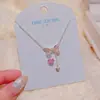 Collar con borlas y lazo de diseño original, estilo dulce y fresco, cadena para la clavícula de lujo ligero de nicho de alta gama con una sensación clara y delicada