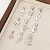 Colgante de cadera transfronterizo con un diseño lindo y juguetón. Acero inoxidable, bañado en oro de 18 quilates, accesorios de colgantes para joyería DIY, venta al por mayor y personalizable