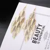 Brincos de anel de vento de metal simples e elegantes estilo europeu e americano retrô exagerados irregulares galvanizados brincos de alta qualidade para mulheres