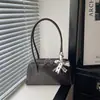 Bolsa de Ombro Única Simples Fashion Retrô Estilo Coreano Nicho Casual Feminina Chegada Nova Primavera 2026 Bolsa de Axila com Personalidade