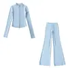 Atacado de fabricante transfronteiriço de roupas femininas 2026 cardigã térmico de gola alta com zíper slim fit e calça de microflare compridas