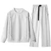 Otoño/Invierno 2026 Nuevo Sudadera con Capucha Casual Holgada de Manga Larga y Pantalones Largos Estilo Americano Trendy con Diseño de Remaches Cuello Redondo Marca Trendy Tridimensional