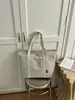 Bolsa de lona casual simple nueva al por mayor transfronteriza, bolsa de mano de gran capacidad para ir al trabajo, bolsa de hombro única para la escuela, bolsa de compras para mujer