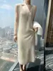 Suéter Recto de Otoño e Invierno Nuevo Vestido sin Mangas de Cuello para Mujer Falda de Punto de Cachemir con Temperamento de Longitud Media