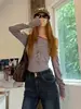 UNBDNS Camiseta de Manga Larga a Rayas de un Solo Hombro Estilo Retro Americano de Alta Gama para Mujer Otoño Nueva Ajustada Transpirable Tendencia