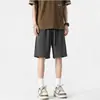 Nuevos shorts casuales de verano a cuadros con cordón para hombres y mujeres, modernos, a la moda, versátiles, holgados, sencillos y elegantes