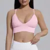 Sujetador deportivo de punto sin costuras de color liso ajustado para mujer, transfronterizo europeo y americano, adecuado para correr, fitness y yoga