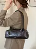 Nova bolsa de nicho estilo francês transfronteiriça para mulheres, bolsa baguette vintage de ombro, elegante para o trabalho e uso casual, bolsa de mão e bolsa de ombro versátil