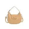 Bolso de mano pequeño retro Yaozi para mujer, nuevo estilo 2026 bolso de mano con forma de media luna, bolso de hombro versátil y simple, bolso de axila tipo empanadilla