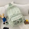 Mochila de doble hombro ligera y de gran capacidad, con diseño a cuadros y ribete de encaje de estilo japonés de alta apariencia, para chicas de secundaria y preparatoria.
