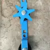 Dispositivo de retorno de cabo para teleféricos com rodas de apoio duplas e sistema de acionamento, usado para transporte de cabos de aço em minas de carvão em carrinhos.