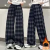 Calça de Flanela Xadrez Wide-Leg para Meninas Outono/Inverno Novo Estilo para Crianças de Tamanho Médio e Grande Estilo Coreano Solta com Caimento Calça de Moletom Casual Espessada Quente