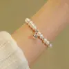 2025 Nova Pulseira de Pérolas de Cristal Contas Design de Nicho Feminino Personalizada Versátil Pulseira Acessórios para Mão Atacado