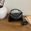 Bolsas de Mujer Transfronterizas, Nuevos Modelos de Verano 2026, Bolsos de Mano de Nicho Estilo Coreano, Bolsos Pequeños Versátiles de Hombro y Cruzados Modernos y Elegantes