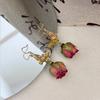 Pendientes elegantes de mariposa con diseño de súper hada y gancho para la oreja, con flores naturales y rosas.