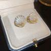Pendientes de plata con forma de corazón, flor, perla y aguja francesa de lujo, con diseño de luz, estilo Joker, de nicho, avanzados, al por mayor para mujer.