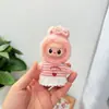 4.0Labubu Cuarta Generación Nuevo Mini Labubu Personaje de Nariz Pequeña Ropa Impermeable Chubasquero y Botas de Lluvia Set