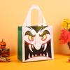 Producto Nuevo Transfronterizo Festival de Fantasmas de Halloween Expresión de Horror Cabeza de Calabaza Embalaje No Tejido Bolsa de Regalo Portátil para Dulces de Niños