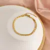 Pulseira de Contas Osso de Cobra de Camada Dupla, Pulseira Banhada a Ouro 18K para Mulheres, Design de Nicho Versátil, Linhas Geométricas Modernas e que Não Desbotam