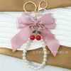 Colgante Creativo de Llavero con Perla de Cereza y Lazo Grande para Mujer, Colgante de Bolso de Moda, Adorno para Llavero de Coche