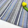 Algodón lino dos colores rayado textura tridimensional sentido estilo Jacquard teñido en hilo tela estilo europeo y americano camisa tela de diseñador para mujer