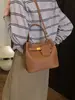 Bolso cruzado de un solo hombro casual de moda con textura simple, bolso de personalidad de estilo nuevo, bolso tipo cubo para mujer, tendencia de invierno 2026