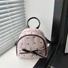 Mochila de Moda Versátil Nueva, Moderna y Elegante para Mujer con Lunares y Lindo Moño, Mochila Única para Mujer Estilo Universitario