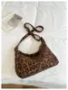 Bolso de leopardo elegante transfronterizo al por mayor para mujer, nuevo bolso de mano grande de capacidad para el día a día, versátil bolso de hombro y cruzado