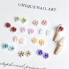 Joyería para uñas de múltiples capas con rosa tallada de tres pétalos luminosa joyería para uñas de floración de celebridad de internet joyería para uñas de flor luminosa venta al por mayor