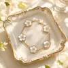 Pulseira Cruzada Popular Flor de Ameixa de Cinco Folhas e Trevo da Sorte de Quatro Folhas, Novo Estilo de Luxo Leve, Exquisita e Versátil, Pulseira de Alta Qualidade para Mulheres