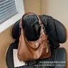 2026 Nova Bolsa de Ombro Única de Couro Macio de Alto Valor Nicho Feminina Bolsa Tote de Grande Capacidade Bolsa de Ombro Fashion para o Dia a Dia