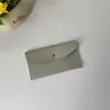 Novidade em Estoque Atacado Cor Sólida Couro Carteira Pequena Porta-Passaporte Estilo Ins Envelope Porta-Moedas Couro Sintético Armazenamento para Óculos